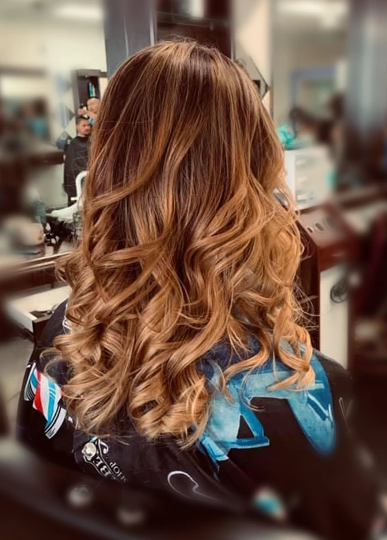 Long warm highlighted curls