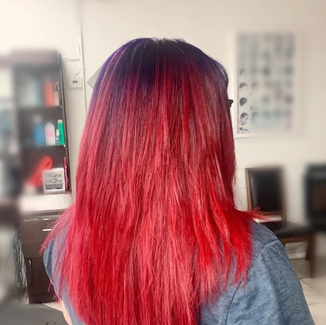 Straight hair with dark roots and red lengths